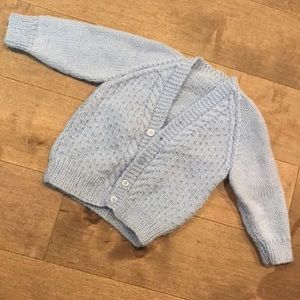 Light blue handmade baby sweater